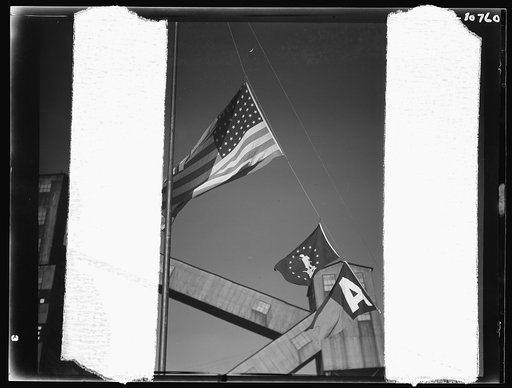 War production drive. Anthracite rallies. Army and U.S. Treasury flags fly alongside the stars and stripes at a Pennsylvania anthracite mine. Coal miners and servicemen joined in the rallies, September 30th through October 1st, in the anthracite region to learn what each is doing to help win the war