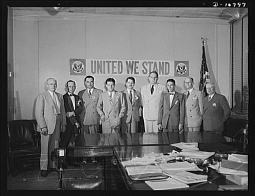 Conference of Regional Directors and Officers of War Production Board (WPB). From left to right: Bruce W. Burroughs, Harry H. Fair, Joseph Overlock, Wade T. Childress, L. Edward Scriven, Walter H. Wheeler, Jr., John C. Virden, R. Eugene Risser and Leslie A. Miller
