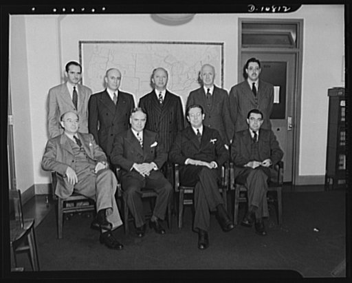 Office of Price Administration Regional Administrators. Regular meeting of OPA Regional Administrators in Washington, D.C., October 14th and 15th, 1942. Standing, left to right: Maxwell McCullough, Dallas, Texas; Clem W. Collins, Denver, Colorado; Harry F. Camp, San Francisco, California; Birkett Wi