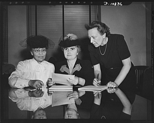 Women's Policy Committee of the War Manpower Commission. At the first meeting of the Women's Policy Committee of the War Manpower Commission on October 1, 1942, three members get acquainted. They are, left to right: Maudelle Bousfield, Margaret A. Hickey, chairman; and Sara Southall. The committee w