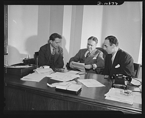Left to right: Dr. John S. Sly, Regional Price Administrator, Office of Price Administration (OPA); Sylvan Joseph, Regional Price Director OPA; A. Antolini, Associate Regional Price Administrator