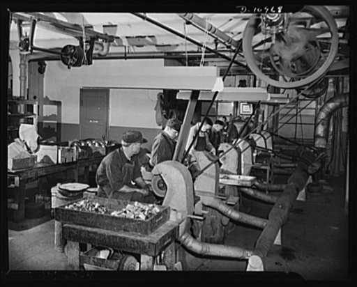 Conversion (auto accessory plant). Workers at a New York City  plant polishing parts for field sterilizers for the U.S. Medical Corps. This firm, engaged formerly in the manufacture of automobile accessories, has been converted ninety percent to war production