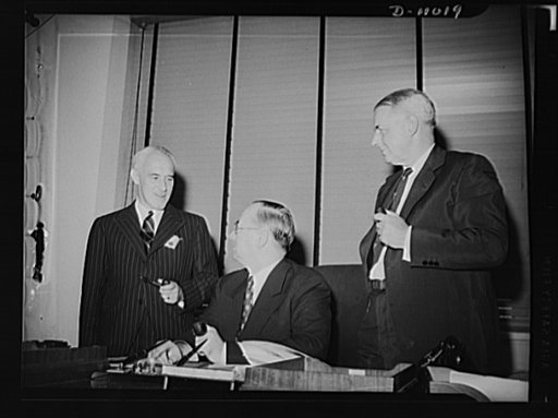 British and American Production and Resources Board. British and American members of combined Production and Resources Board at press conference held July 31, 1942. Left to right: Sir Robert Sinclair, Captain Lyttleton's deputy on the board; Donald M. Nelson, board member; J. S. Knowlson, Mr. Nelson