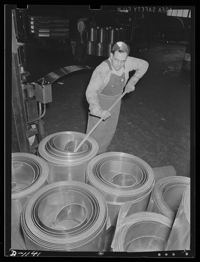 Aluminum. Reynolds Metal Company, Louisville, Kentucky. Coils of sheet aluminum for stamping into powder cans as part of the national defense production program