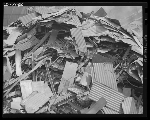 Steel manufacture, Allegheny-Ludlum. It won't be long now! Here's a pile of scrap collected from various roadside junkheaps for re-use by the steel mills producing for defense. Soon it will be loaded into open hearth and other types of furnaces to be used in the production of new steel for defense i