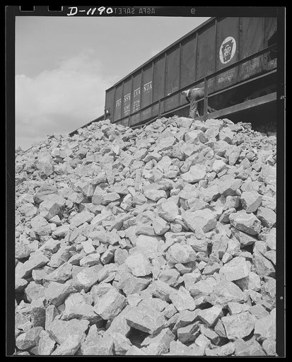 Steel manufacture, Allegheny-Ludlum. This doesn't look very impressive, just a pile of rock. Well, that's what it is, a pile of limesone, but since limestone is the main ingredient for the refining of high quality steels, heaps of rock such as these mighty important factors in the maintenance of def