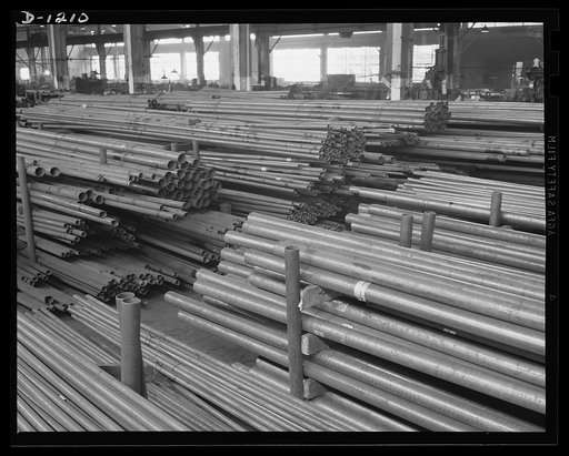 Steel manufacture, Allegheny-Ludlum. This quality steel tubing and piping will eventually be used to convey, refine or distill elements used in defense production. Expensive alloy steels are used, particularly for chemical piping. Special alloys have been devised to resist specific chemicals