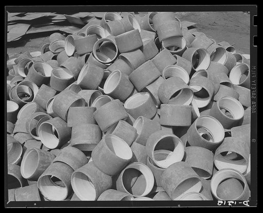 Steel manufacture, Allegheny-Ludlum. Steel couplings such as these are used to extend short lengths of pipe for many miles. Steel piping is used to convey solutions and gases in numerous plants engaged in defense production