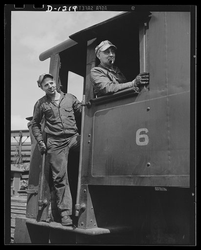 Steel manufacture, Allegheny-Ludlum. A rigid schedule, though they don't cover much ground. These men operate a locomotive inside the plant grounds, hauling scrap and other ingredients to the open hearth and electric furnaces for melting and refining