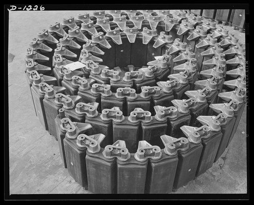 Chrysler tank arsenal. The M-3 tank has an overall length of 18 feet, which means the track for one-side of this 28- ton monster is about 40 feet long. Each individual tread is made of solid rubber