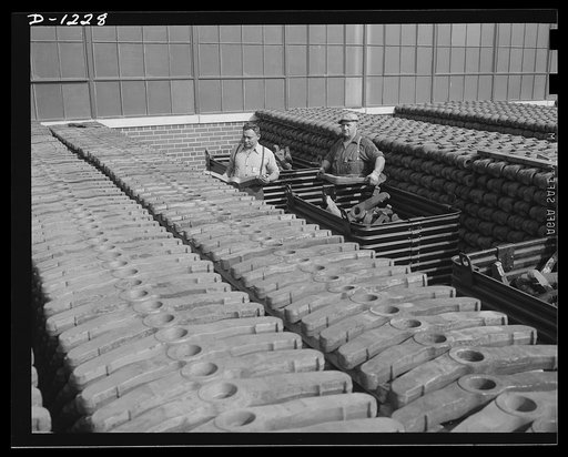 Tank manufacture (Chrysler). Stockpiles such as these need constant replenishment now that M-3 tanks have reached a mass production schedule. These are wheel suspension lever forgings, stored outside the huge Chrysler tank arsenal in Detroit where 10,000 workers are turning out twenty-eight ton roll