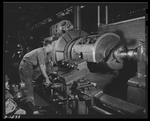 Chrysler tank arsenal. Close work is done on this milling machine, designed for work on the turret of the 75 mm gun with which M-3 tanks are eqipped. The fittings must be perfect, in order that the gun may have as much play as possible. Four turning, tools and two facing tools are used