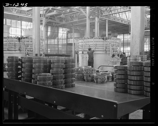 Tank manufacture (Chrysler). Twelve of these bell type carburizing furnaces are in twenty-four hour operation at the huge Chrysler tank arsenal in Detroit. They are employed to barburize final drive gears, transmission parts and other parts of the twenty-eight ton M-3 tanks in production there