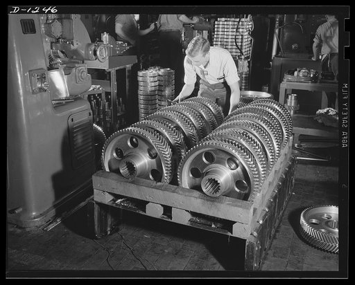 Chrysler tank arsenal. Headed for the oven, this rack of herringbone gears has been completed and is now awaiting the hear treatment which will harden the gears for use in the M-3 tank. Dozens of different types of gear arrangements are used in these twenty-eight ton monsters