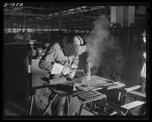 Tank manufacture (Chrysler). Expert welders are important to Uncle Sam's defense industries. Not only are welded connections as strong as, or stronger than, riveted connections, but they mean a saving steel and in overall weight. This welder is working on the engine support assembly of an M-3 tank a
