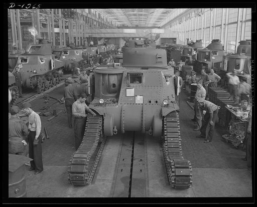 Chrysler tank arsenal. Workers in the huge tank Chrysler arsenal near Detroit, putting the tracks on one of the giant M-3 tanks. These rolling arsenals weigh twenty-eight tons, are capable of speeds over twenty-five miles an hour and are equipped with 75 mm. field artillery gun and a 37 mm. anti-air