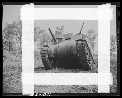Chrysler tank arsenal. Off for a trial run. Each completed M-3 tank gets a seventy-five mile test run over all sorts of rough terrain. The proving ground adjoins the huge Chrysler tank arsenal near Detroit where these twenty-eight ton behemoths are produced