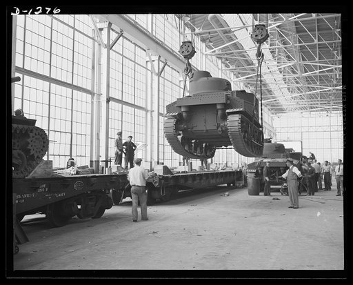 Chrysler tank arsenal. This may look like one of the games you used to play with your erector set, but that tank, which is about to be deposited on a railroad flat car by a fifty-ton crane weighs more than twenty-eight tons. It's one of the new M-3s being built for the Army by the Chrysler tank arse