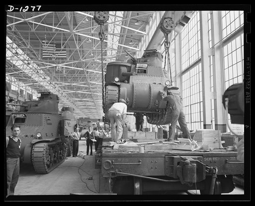 Chrysler tank arsenal. This may look like one of the games you used to play with your erector set, but that tank, which is about to be deposited on a railroad flat car by a fifty-ton crane weighs more than twenty-eight tons. It's one of the new M-3s being built for the Army by the Chrysler tank arse