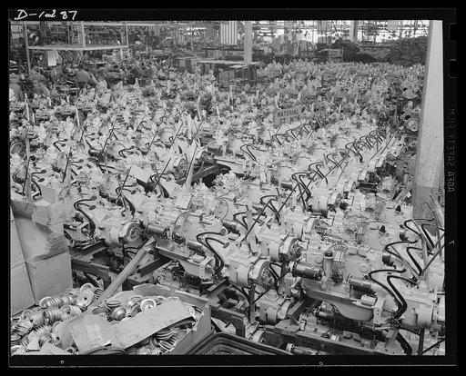 Army truck manufacture (Dodge). A veritable forest of power. A huge bank of Army and commercial truck engines, but only a very small portion of the power plants required for one day's production