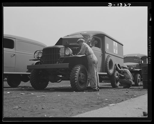Army truck manufacture (Dodge). U.S. Army ambulance mounted on a Dodge truck chassis being given final inspection by government experts before it is delivered to the War Department