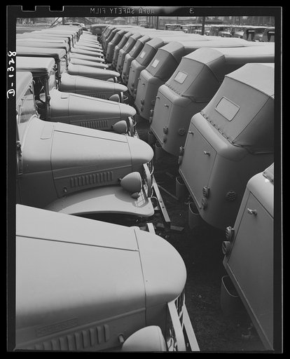 Army truck manufacture (Dodge). Line-up of U.S. Army trucks at the Dodge Lynch Road plant in Detroit, ready for shipment to Army posts throughout the country