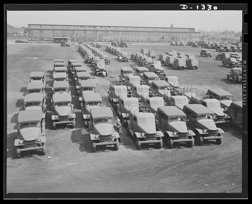 Army truck manufacture (Dodge). General view of various types of U.S. Army trucks in the large field at the Dodge Lynch Road plant at Detroit, where they are held for various inspections and adjustments before being delivered to the War Department