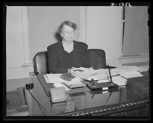 Mrs. Roosevelt being sworn in as Mayor La Guardia's assistant in the Office of Civilian Defense. Mrs. Roosevelt's title is Assistant Director of the Office of Civilian Defense. The ceremony took place on the morning of September 29