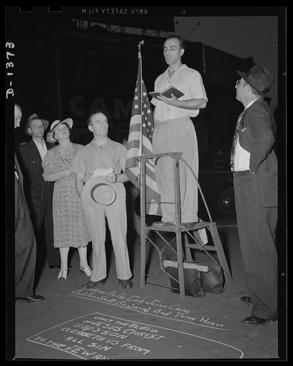 The four freedoms. The stars and stripes are more common than ever in Columbus Circle, New York's famous proving ground for speakers representing all sects and creeds. A noteworthy effect of the attack upon democracy has been the sudden rallying to the flag of millions of people whose Americanism, t