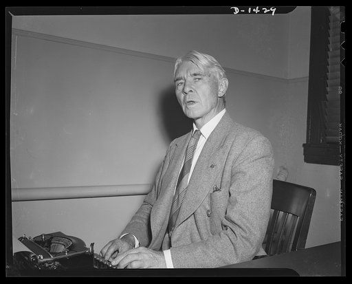Poet and historian turns to films. Carl Sandburg is shown here as he was writing the commentary for "Bomber", national defense motion Picture just completed by the Office of Emergency Management (OEM) film unit. Mr. Sandburg is famous as the Pulitzer prize winning author of "The War Years," monument