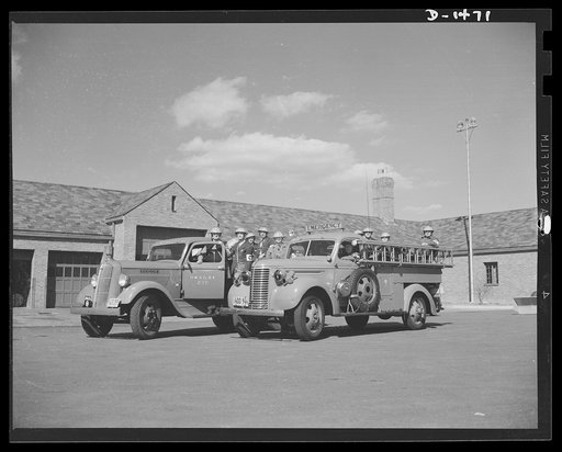 Civilian protection. Accompanied by volunteer members of a repair squad, a public utility goes forth in well-equipped trucks to repair damage to the lines