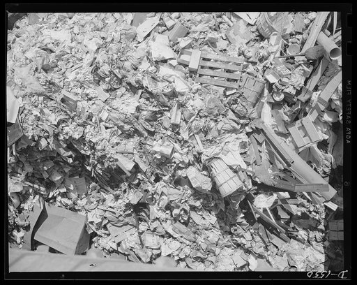 Waste paper. Waste is an American characteristic. For too many years we have simply thrown things out when we were through with them, without a thought that they might be reused. Here on this garbage scow carrying rubbish for disposal is a huge stock of waste paper, so vitally needed today for conve