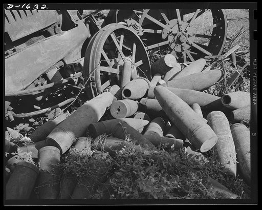 Weapons from waste. This is where they come in. These old shells rested for years, along with thousands of other discarded articles, in a junkyard, but now they'll be given another chance to serve their country. Junk today, they'll be melted down to provide the streamlined armament of tomorrow