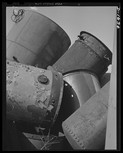 Weapons from waste. These will never heat a building again, but they may have a lot to do with protecting buildings from air raids one of these days. These boilers will be stripped and the valuable metal in them reused by steel mills for the machinery of defense