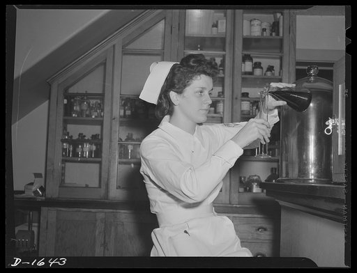 Student nurses spend many fascinating hours in the laboratory. Attractive young student, above, measures liquid for chemistry experiment
