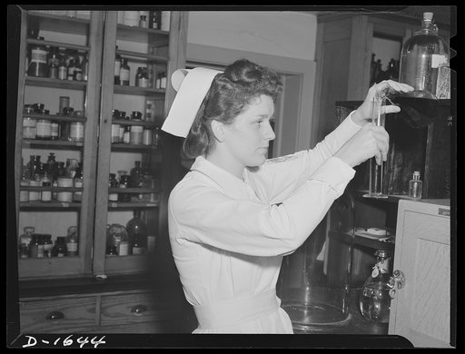 Student nurses spend many fascinating hours in the laboratory. Attractive young student, above, measures liquid for chemistry experiment