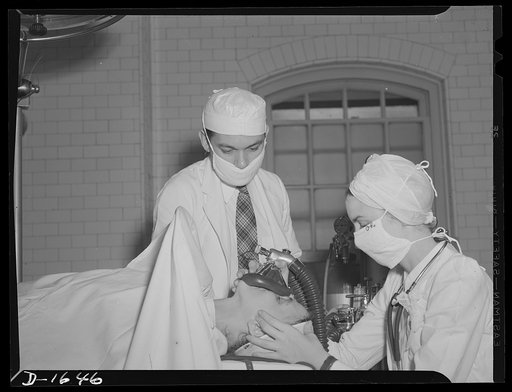 Graduate register nurse, above, receives instruction in technique of anesthesia from doctor. There is a great demand for more well qualified anesthetists at present