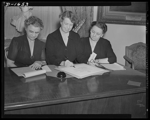 Left to right: Mrs. Henrietta Nesbitt, White House housekeeper; Mrs. Roosevelt, Assistant Director of the Office of Civilian Defense: Harriet Elliott, Associate Administrator in charge of the Consumer Division, Office of Price Administration (OPA). Mrs. Roosevelt and Mrs. Nesbitt, took the "Consumer
