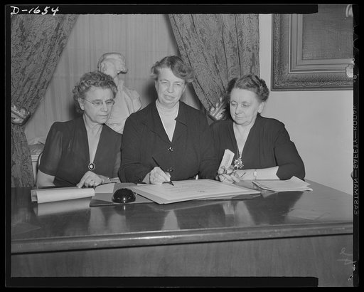 Left to right: Mrs. Henrietta Nesbitt, White House housekeeper; Mrs. Roosevelt, Assistant Director of the Office of Civilian Defense: Harriet Elliott, Associate Administrator in charge of the Consumer Division, Office of Price Administration (OPA). Mrs. Roosevelt and Mrs. Nesbitt, took the "Consumer