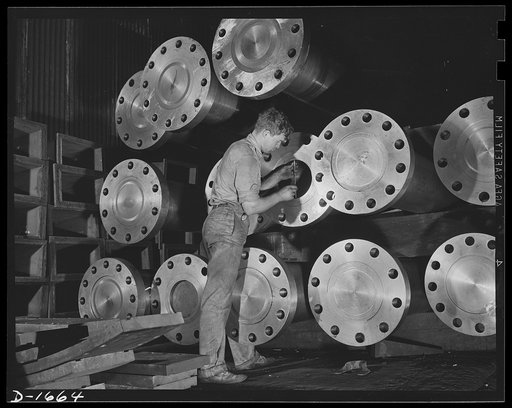 Shipbuilding (Newport News). Here is driving power for the Navy, a group propeller shafts waiting for installation in new destroyers for our two-ocean Navy
