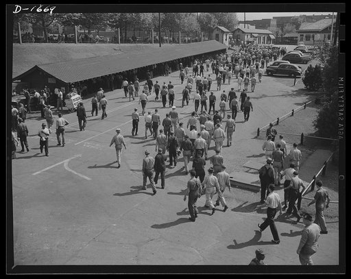 Shipbuilding (Newport News). These are the men whose skill is devoted to the building of the finest, most powerful fleet of naval vessels the world has ever seen. They are leaving the gates of the yard, after their regular shift