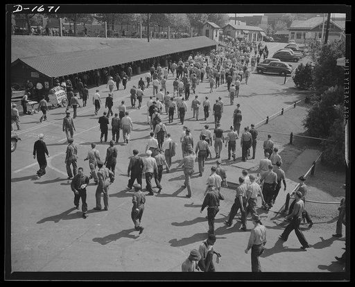 Shipbuilding (Newport News). These are the men whose skill is devoted to the building of the finest, most powerful fleet of naval vessels the world has ever seen. They are leaving the gates of the yard after their regular shift