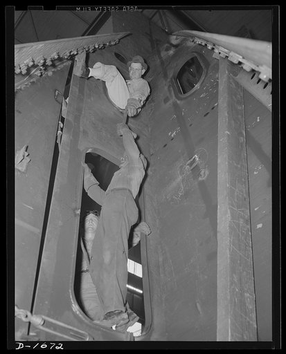 Shipbuilding (Norfolk Navy Yard). This is one one-thousandth of the manpower engaged in the construction of Uncle Sam's new 70,000,000 battleship the USS Alabama, which is scheduled to be launched in February, 1942. Approximately 3000 men are working to complete this mighty mistress of the seas. The