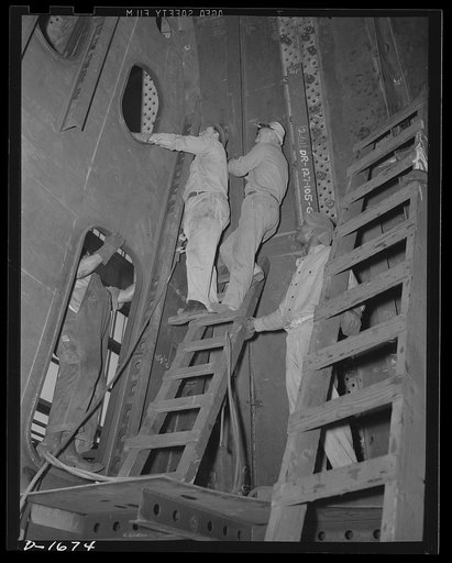 Shipbuilding (Norfolk Navy Yard). This group of four of the 3,000 workers are engaged in building the huge 70 milllion dollar battleship Alabama, is working on the superstructure of the vessel, which will make a huge addition to the U.S. two-ocean Navy when it is launched in February 1942