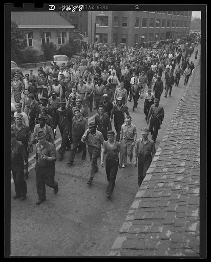 Shipbuilding (Newport News). These are the men whose skill is devoted to the building of the finest, most powerful fleet of naval vessels the world has ever seen. They are leaving the gates of the yard after their regular shift