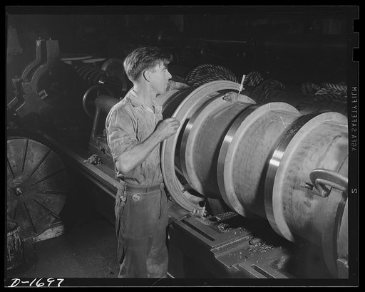 Shipbuilding (Newport News). It's got to measure up, or else. This skilled worker is checking the dimensions of a tail shaft bearing for a navy vessels under construction. All these various parts must fit perfectly to assure maximum performance, and maximum performance is a "must" in the finest flee