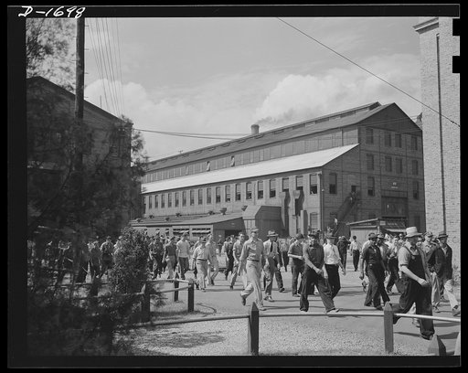 Shipbuilding (Newport News). These are the men whose skill is devoted to the building of the finest, most powerful fleet of naval vessels the world has ever seen. They are leaving the gate of the yard after their regular shift