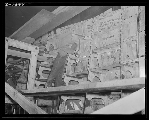 Shipbuilding (Norfolk Navy Yard). One of the major advances in shipbuilding during the last few years has been the substitution of welding for rivets in a number of vital parts of warcraft. Welding means much less weight and much less steel for each ship. This welder, working on the nose section of 