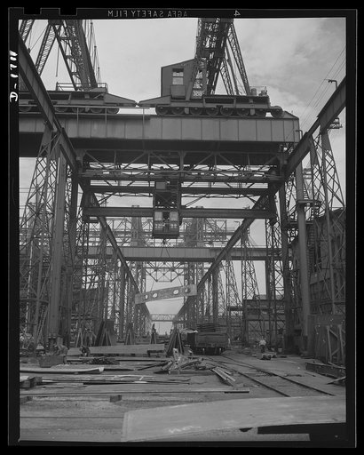 Shipbuilding (Newport News). Here is a section of the huge building ways, large enough to permit construction of the largest of super-battleships. Construction of these new ways is a major engineering job in itself