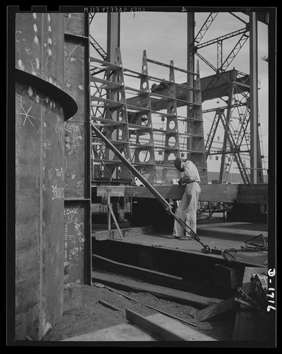 Shipbuilding (Newport News). This is a structural section, where preliminary work is done before the sections for new naval vessels are brought by overhead carriers to the ways, where they will become a part of the assembled ship